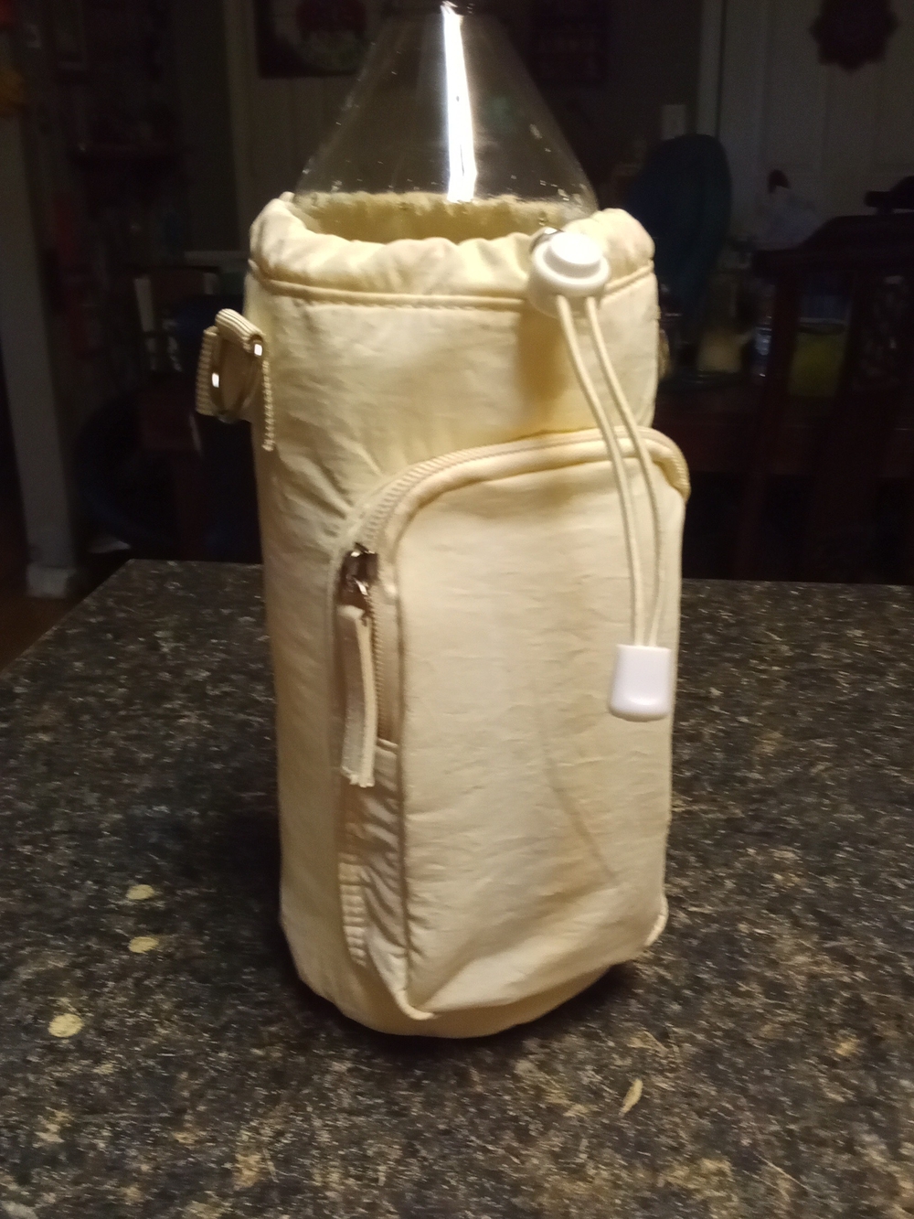 Cream Bottle Carrier with Phone Pocket